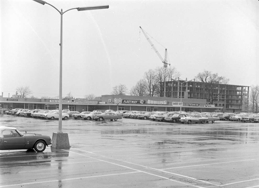 A black and white photo of a shopping plaza now known as Cherryhill Village Mall